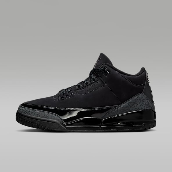 Tenis jordan negros con rojo on sale